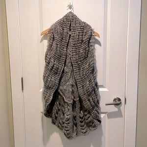 La Cite grey sleeveless sweater with small feather detail, size XS. Like new!